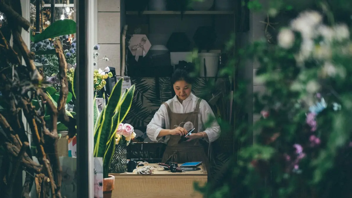A florist working in her small shop